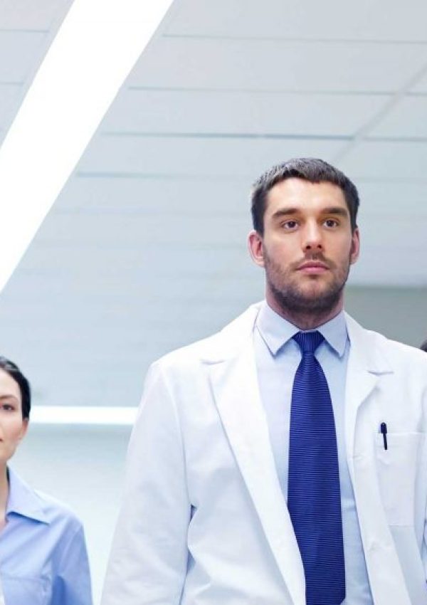 group-of-medics-walking-along-hospital-P92EJ7V-1024x577